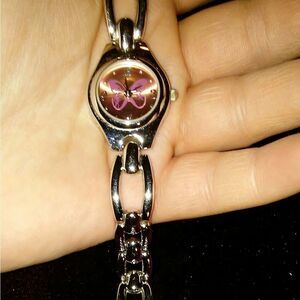 Silver Advance watch with round, pink face